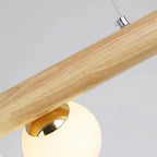 Suspension en bois et globes de verre opalin, 5 ou 7 lumières