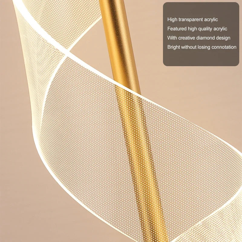 Lampe de table LED spirale en acrylique sur tige dorée, 34 cm
