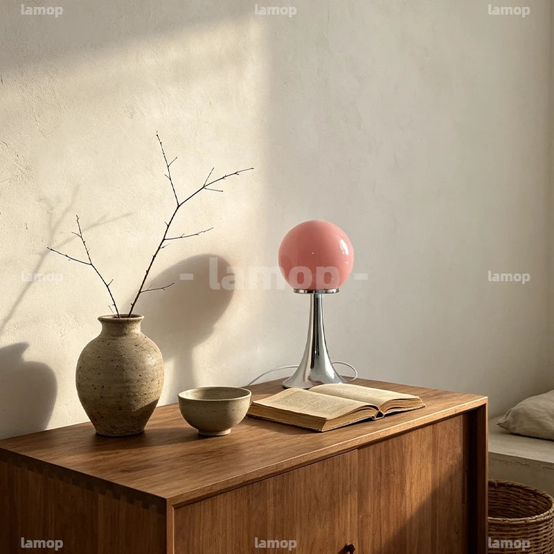 Lampe à poser boule de verre colorée sur pied tulipe chromé