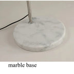 Lampadaire arc chromé, dôme blanc ou orange, socle en marbre