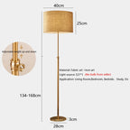Lampadaire télescopique doré, abat-jour tambour en lin beige