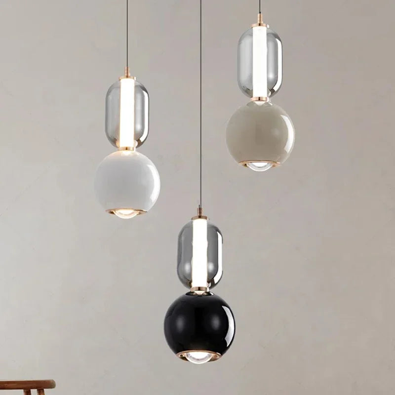 Suspension design capsule de verre fumé sur sphère laquée, LED 10 W