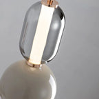 Suspension design capsule de verre fumé sur sphère laquée, LED 10 W
