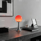 Lampe à poser boule de verre colorée sur pied tulipe chromé
