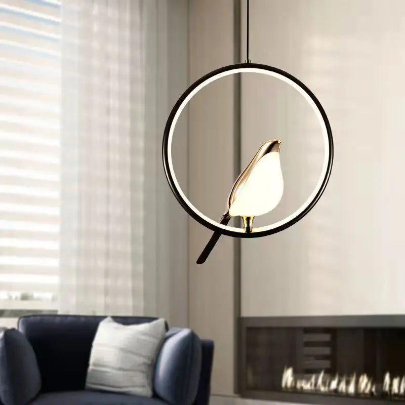 Suspension oiseau LED dans un anneau, ellipse ou cercle doré