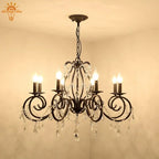 Lustre noir en fer à 8 bras en volutes et pampilles facettées