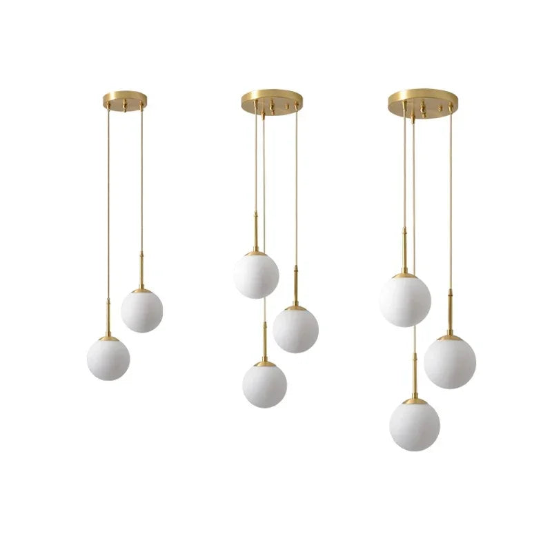 Suspension globe en verre opalin Ø 15 cm, 1 à 3 boules en cascade