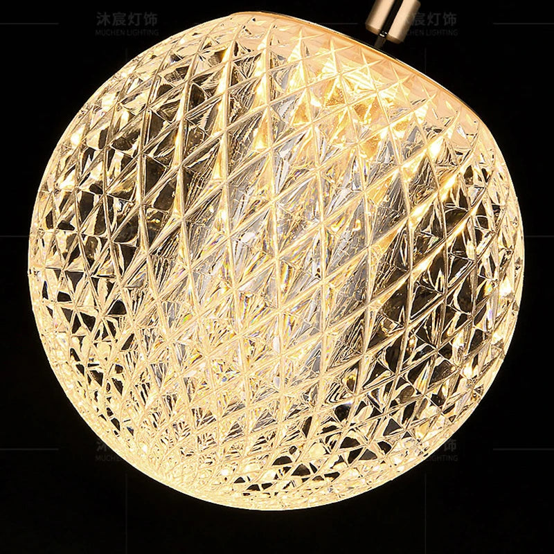 Suspension LED globe transparent à facettes losange, finition dorée