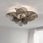 Lustre fleur en voiles de PVC strié, blanc ou noir, LED trois teintes
