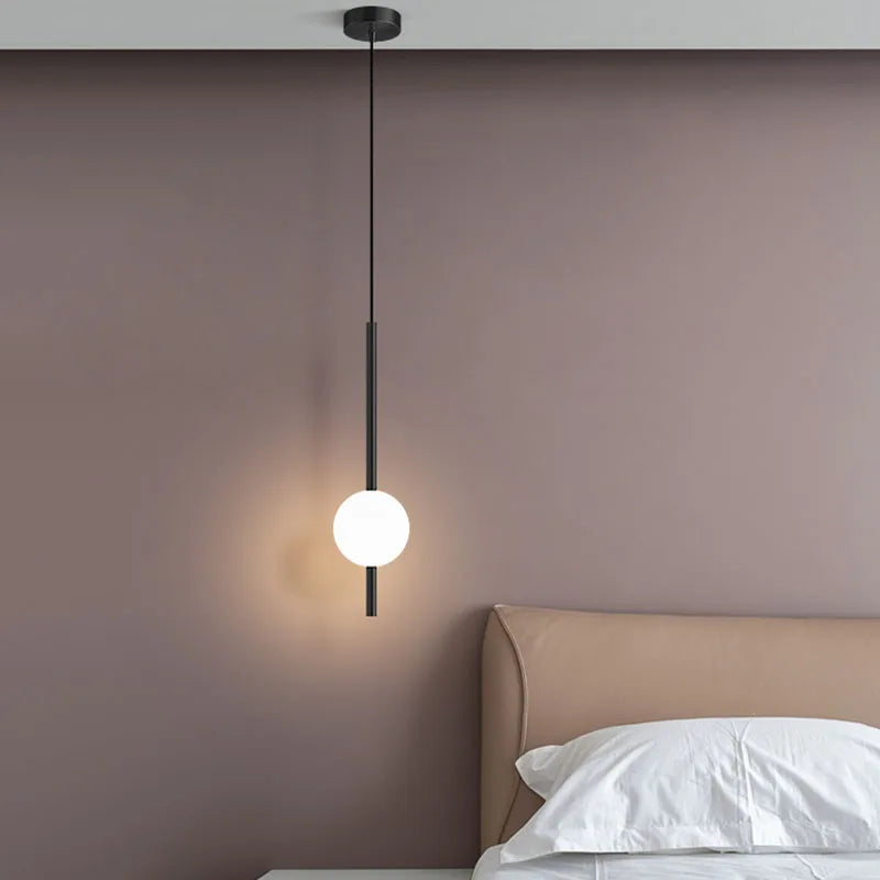 Suspension de chevet LED, globe Ø 10 cm sur tige, dorée ou noire