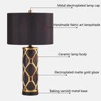 Lampe à poser en céramique à résille dorée, abat-jour tambour 35 cm