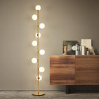Lampadaire doré à neuf petits globes en verre givré en spirale