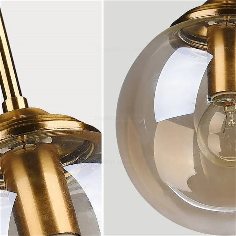 Petite suspension globe en verre Ø 15 cm, tube doré, câble 80 cm