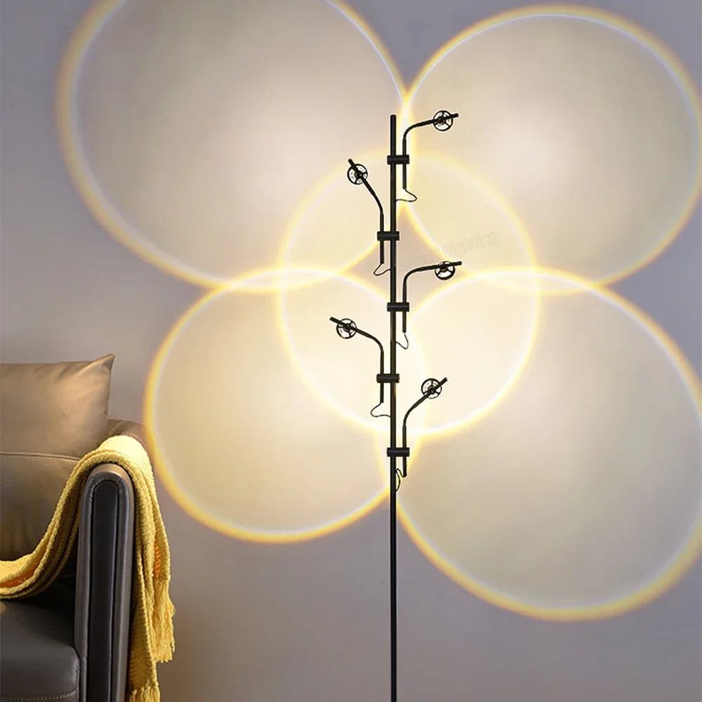 Lampadaire LED à têtes orientables projetant des halos de lumière