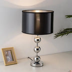 Grande lampe à poser chromée à trois boules, abat-jour noir rayé