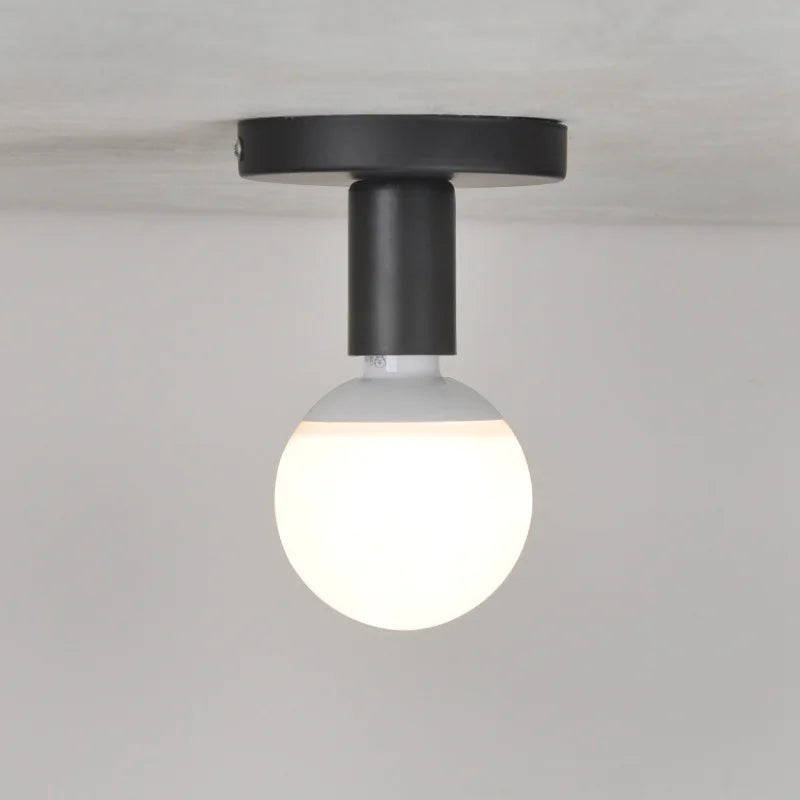 Plafonnier minimaliste noir à douille E27 apparente, platine 10 cm