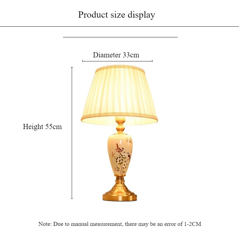 Lampe à poser en céramique peinte oiseaux et fleurs, socle doré