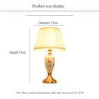 Lampe à poser en céramique peinte oiseaux et fleurs, socle doré