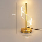 Lampe de table LED spirale en acrylique sur tige dorée, 34 cm