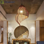 Suspension coquillage en spirale d'osier, marron ou naturel