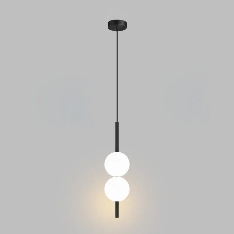 Suspension de chevet LED, globe Ø 10 cm sur tige, dorée ou noire