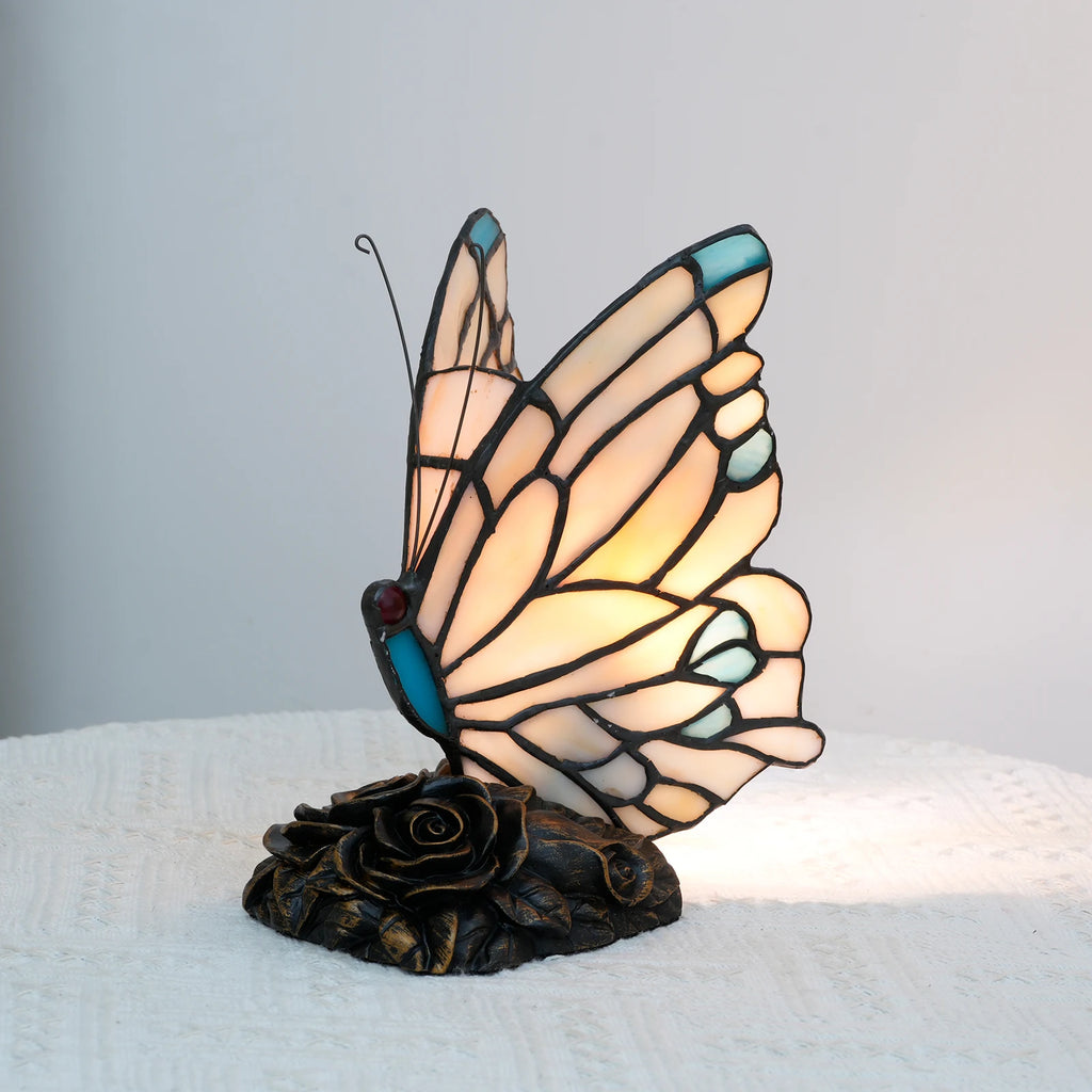 Lampe papillon style Tiffany en vitrail crème et bleu, socle à roses