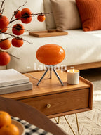 Lampe de chevet ovale en verre orange sur trépied chromé, 27 cm