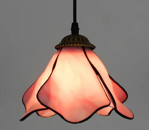 Morceaux de verre teinté sertis comme un vitrail