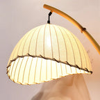 Lampadaire arc tige effet bambou, abat-jour festonné en tissu