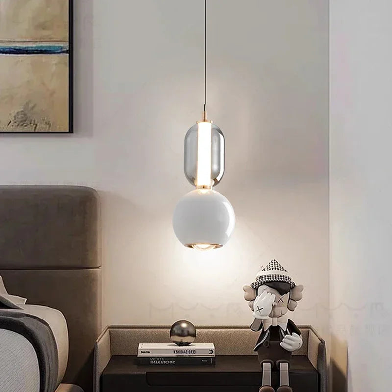 Suspension design capsule de verre fumé sur sphère laquée, LED 10 W
