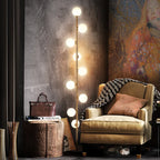 Lampadaire doré à neuf petits globes en verre givré en spirale