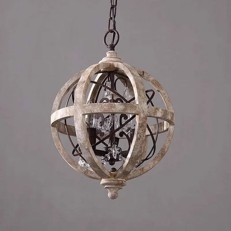 Lustre boule en bois patiné, 3 chandelles E14 et pampilles