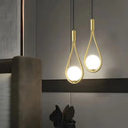 Suspension goutte en métal doré ou noir et globe opalin, G9 LED