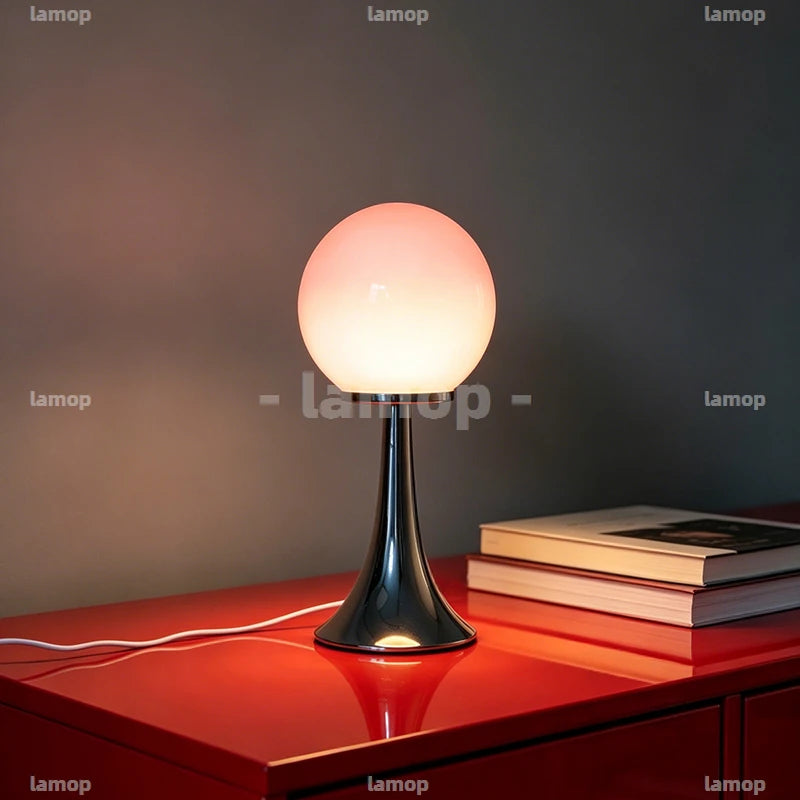 Lampe à poser boule de verre colorée sur pied tulipe chromé