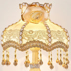 Lampe de chevet ancienne en résine ciselée et pampilles, 5 décors