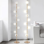 Lampadaire doré à neuf petits globes en verre givré en spirale