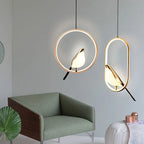 Suspension oiseau LED dans un anneau, ellipse ou cercle doré