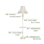 Lampadaire classique crème, abat-jour à franges et tablette en verre
