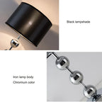 Grande lampe à poser chromée à trois boules, abat-jour noir rayé