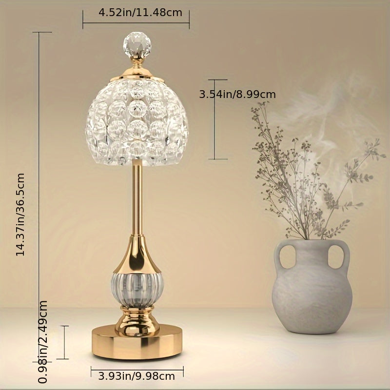 Lampe de table sans fil à dôme facetté et pied doré balustre