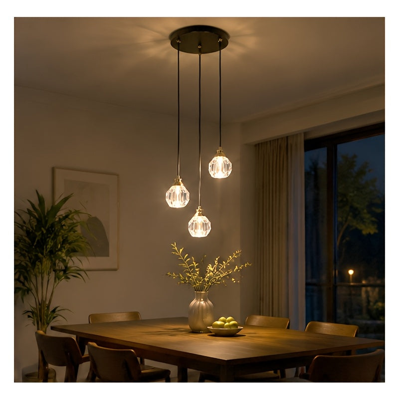Suspension 3 globes en cristal taillé sur platine noire, câbles 110 cm