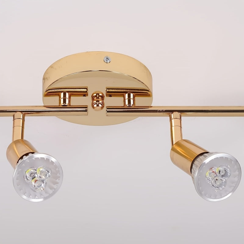 Plafonnier doré à 4 spots GU10 orientables sur rampe de 62 cm