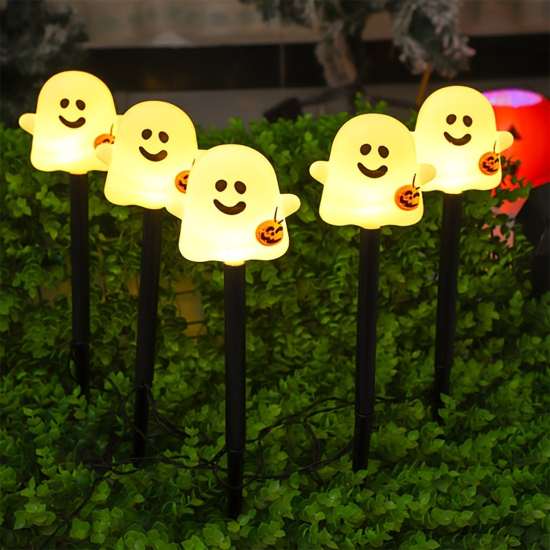 Fantômes lumineux solaires au sourire malicieux d'Halloween