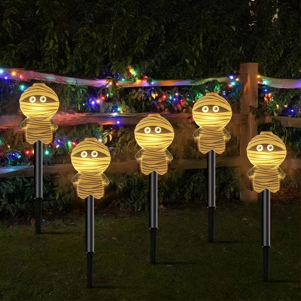 Guirlande solaire de 5 momies lumineuses à planter pour Halloween