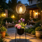 Lampadaire solaire rétro à boule ajourée sur trépied porte-fleurs
