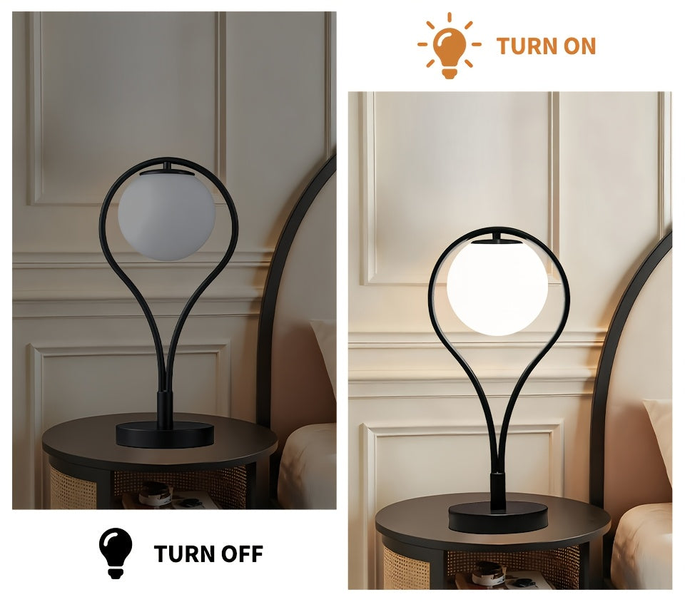 Lampe de chevet noire, globe en verre opalin dans un arceau