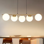 Suspension 5 globes opalins sur barre dorée de 90 cm, E27