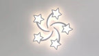 Plafonnier LED étoiles filantes Ø 70 cm, éclairage RVB et télécommande