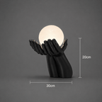 Applique murale deux mains noires tenant un globe, douille G9