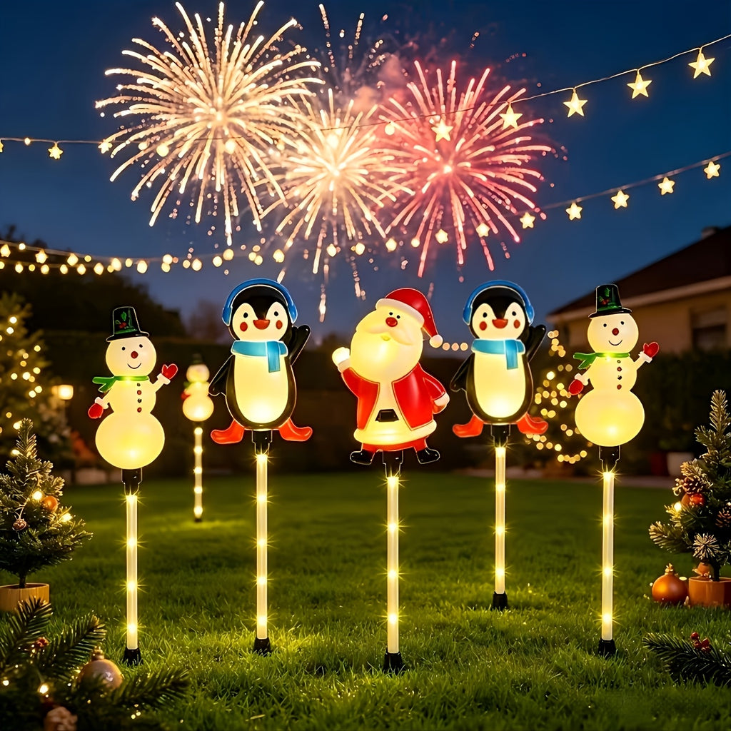 Lampe solaire de Noël à piquets, bonhommes de neige et pingouins
